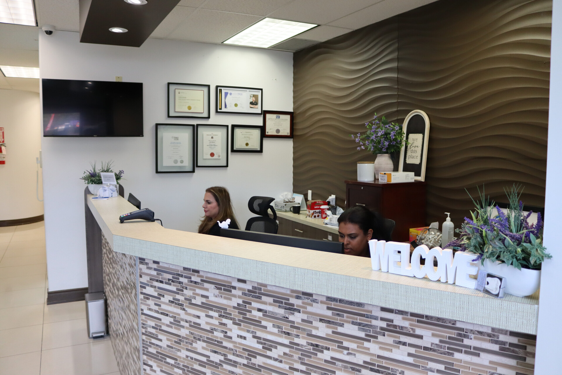 Dentist performing a routine checkup at Hamilton Care Dental Centre